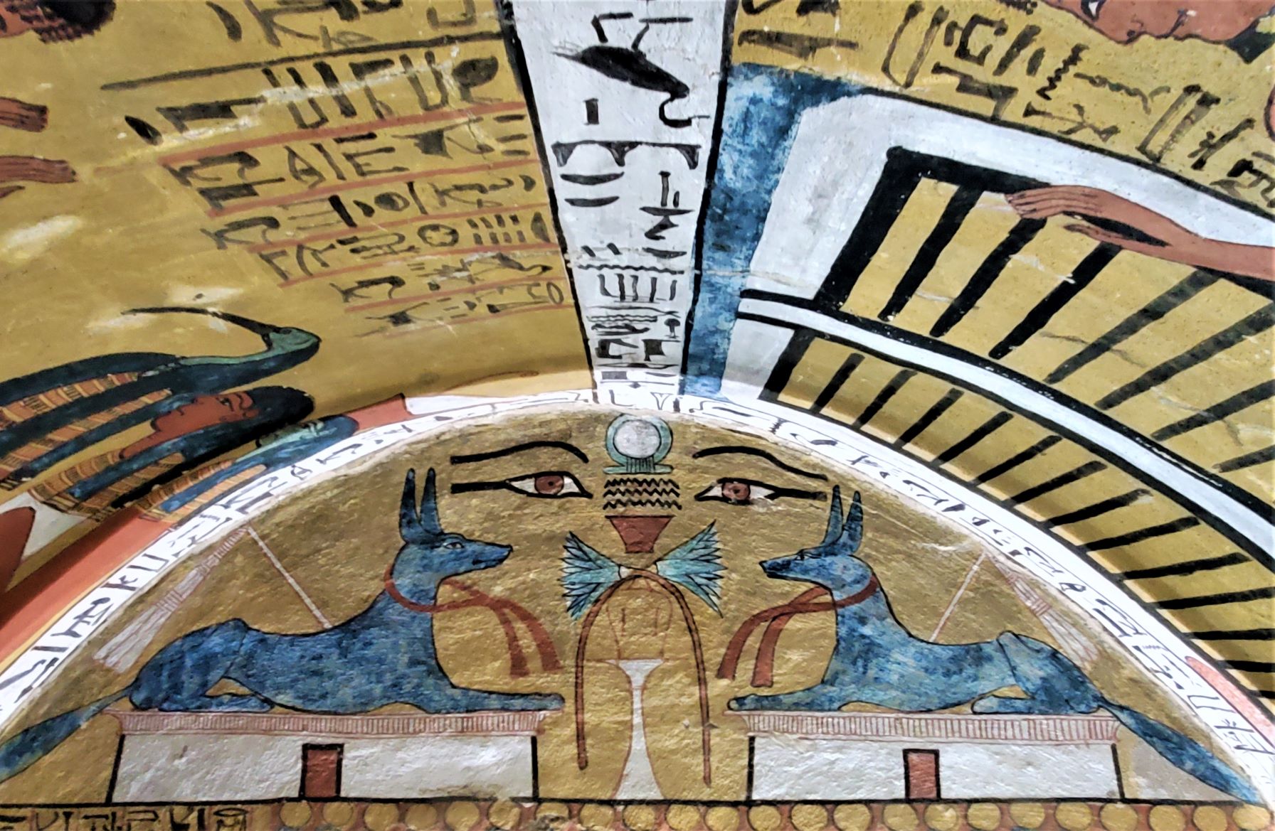 inside a colorful tomb in the West Bank in Luxor Egypt