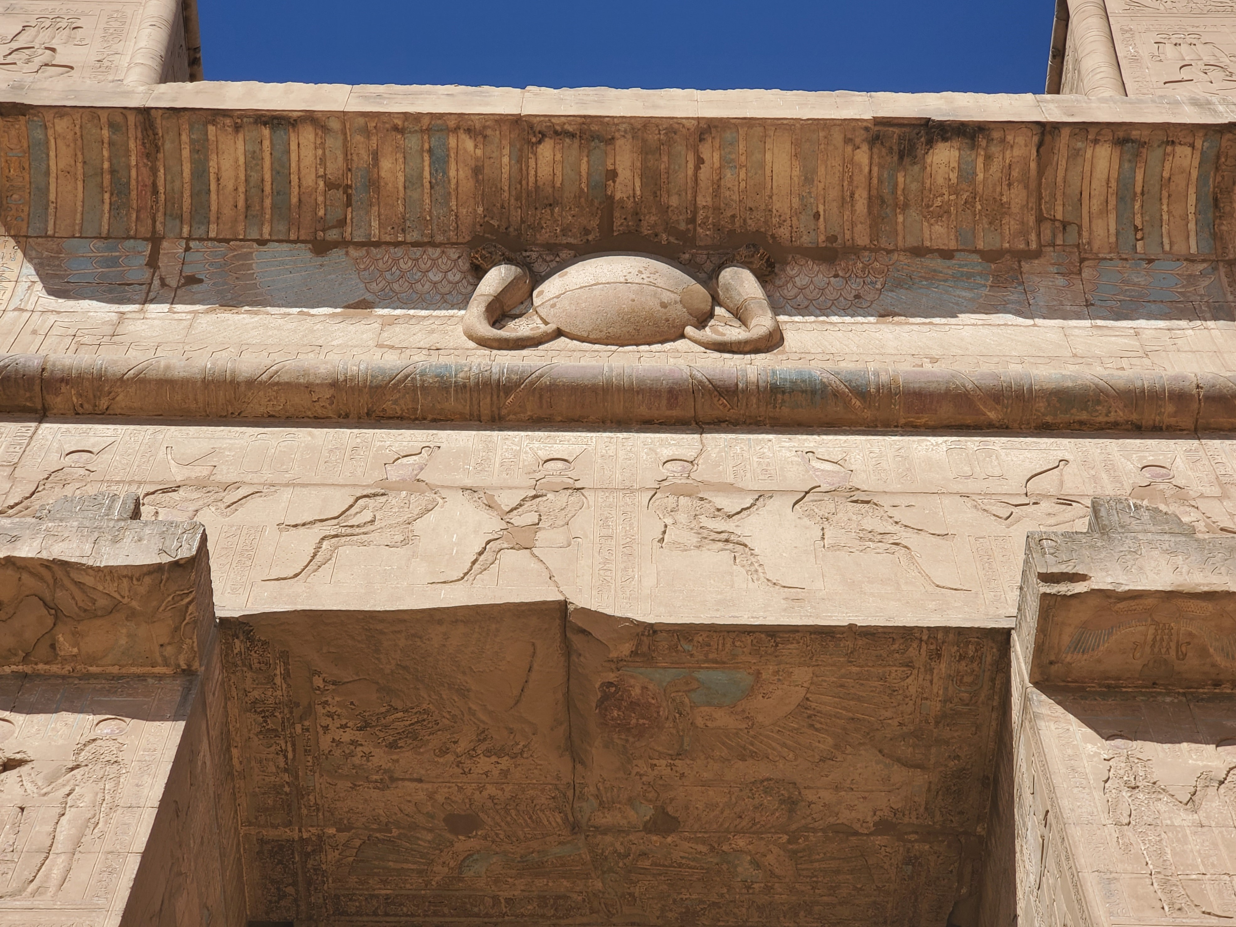 A view of the carvings and colors of the lintel at the Temple of Horus at Edfu